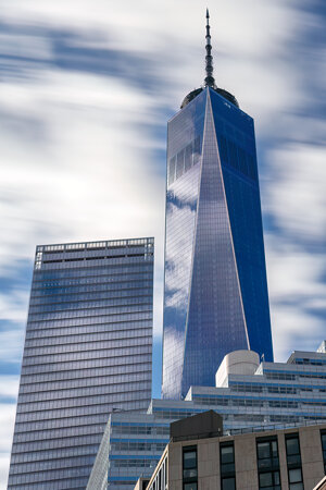 Long exposure of clouds over One World Trade Center, also known as the Freedom Tower in Lower Manhat