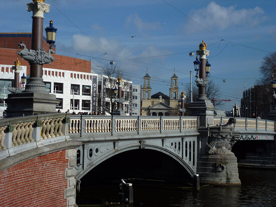 Bridge near the end of the river Amstel in Amsterdam