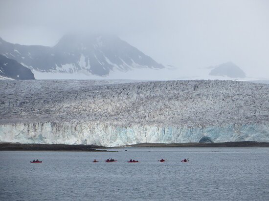Kayaking away from glacier
